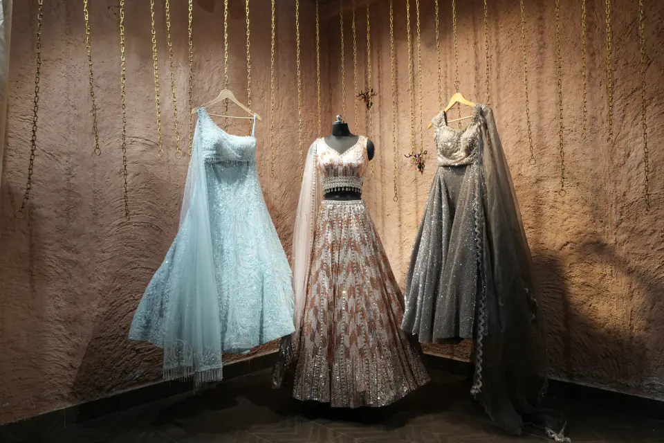 Behind the Scenes by Yukti Vohra — three lehengas ready for the shoot