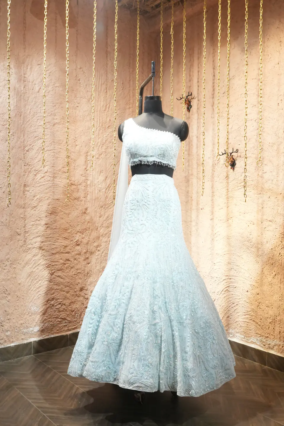Ice-Blue One-Shoulder Lehenga by Yukti Vohra — front view