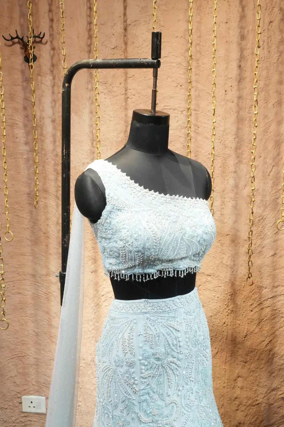 Ice-Blue One-Shoulder Lehenga by Yukti Vohra — bodice and cape detail