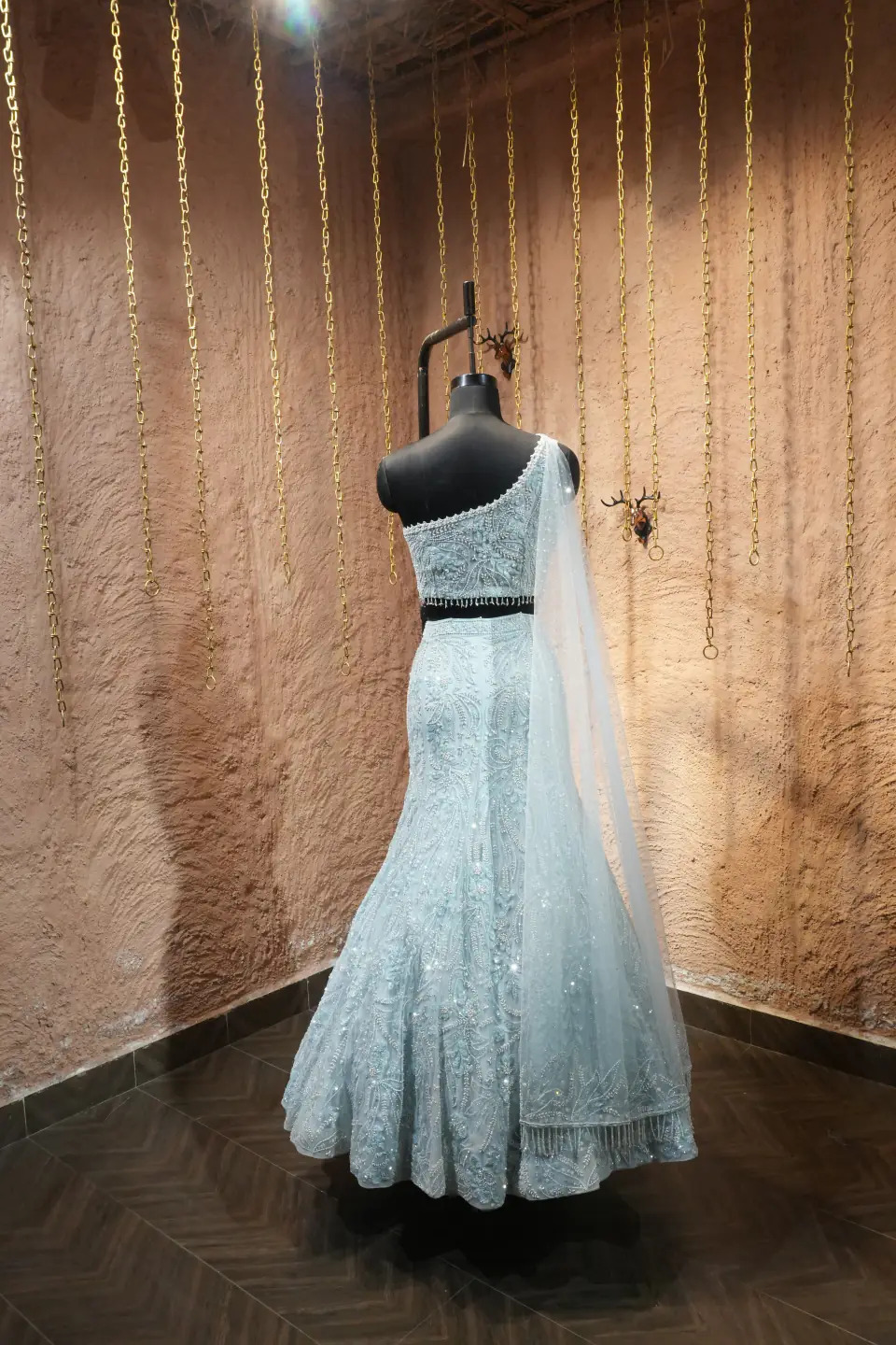 Ice-Blue One-Shoulder Lehenga by Yukti Vohra — three-quarter view