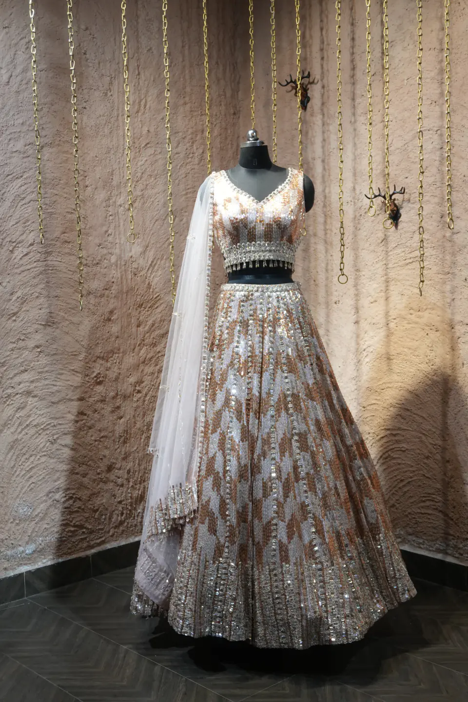 Ivory Sequin Chevron Lehenga by Yukti Vohra — front view