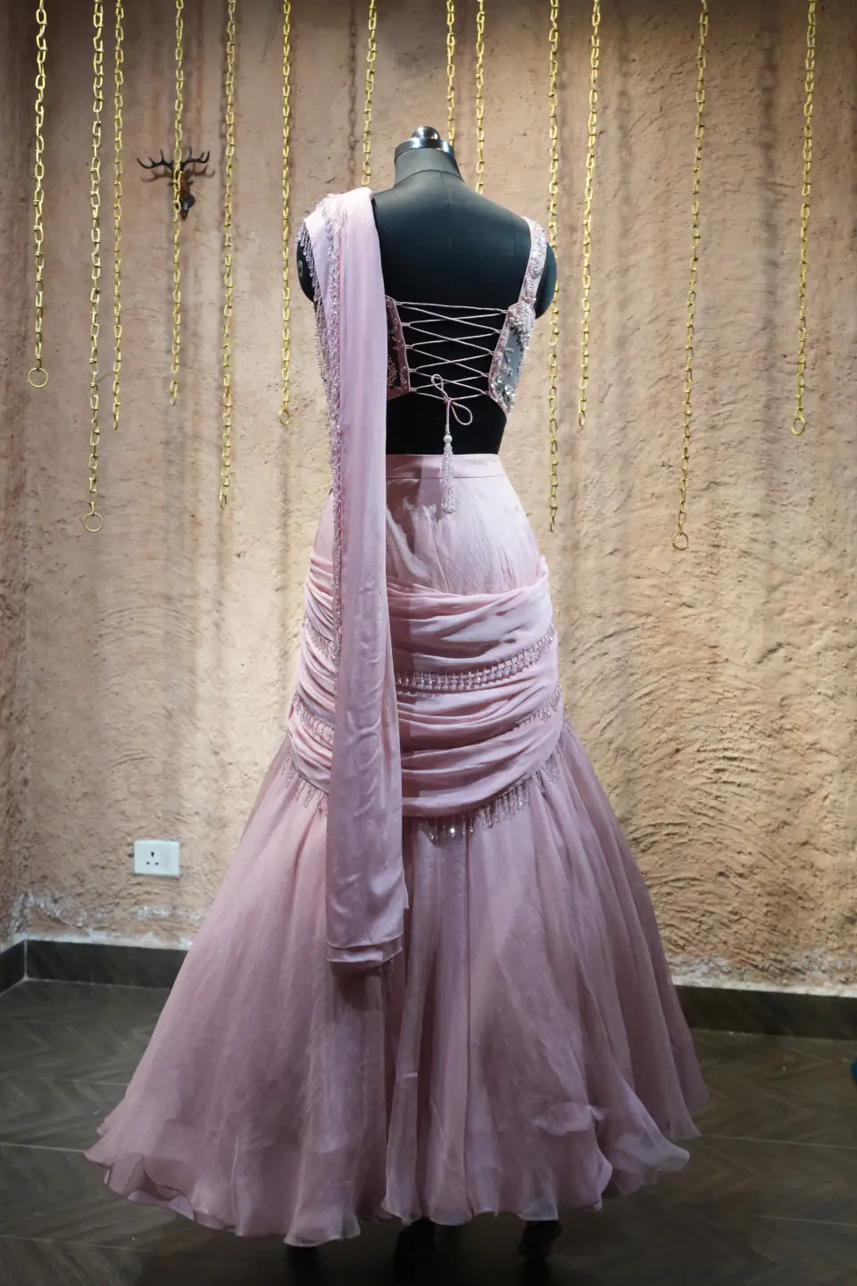 Lilac Draped Corset Lehenga by Yukti Vohra — back view with dupatta