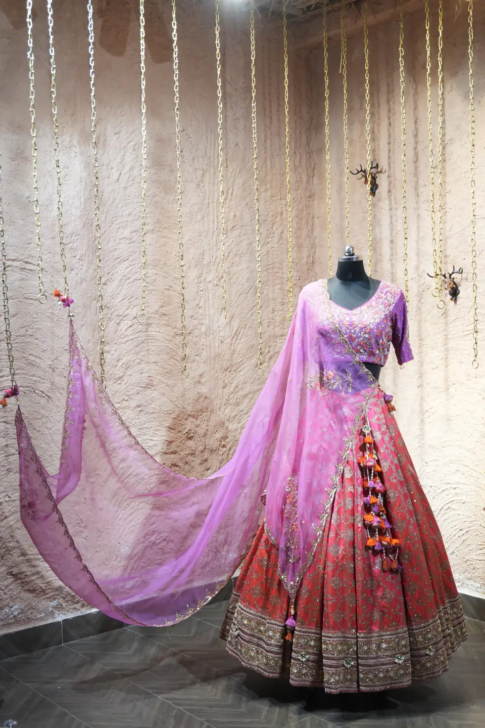 Orchid and Coral Lehenga by Yukti Vohra — flowing dupatta