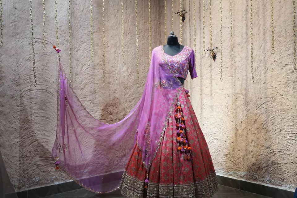 Orchid and Coral Lehenga by Yukti Vohra — flowing dupatta in the atelier