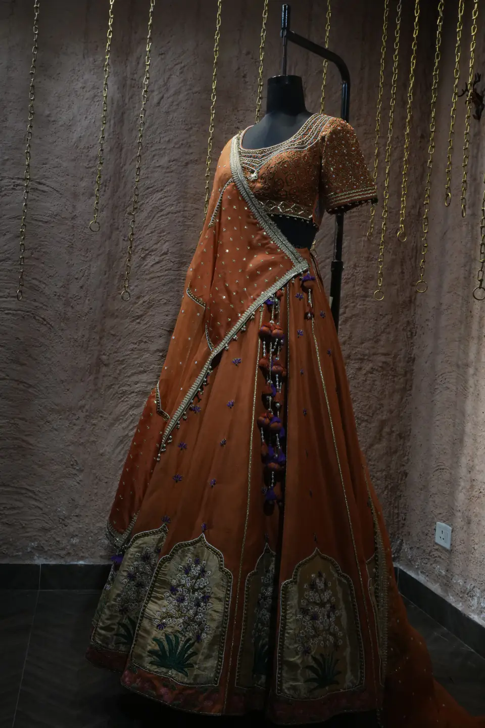 Rust Silk Lehenga with Mughal Arch Panels by Yukti Vohra — draped dupatta, full length