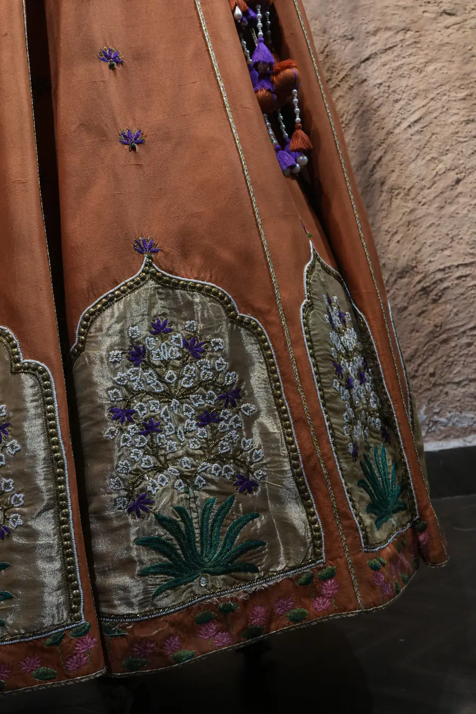 Rust Silk Lehenga with Mughal Arch Panels by Yukti Vohra — hand-embroidered Mughal arch panel, close up