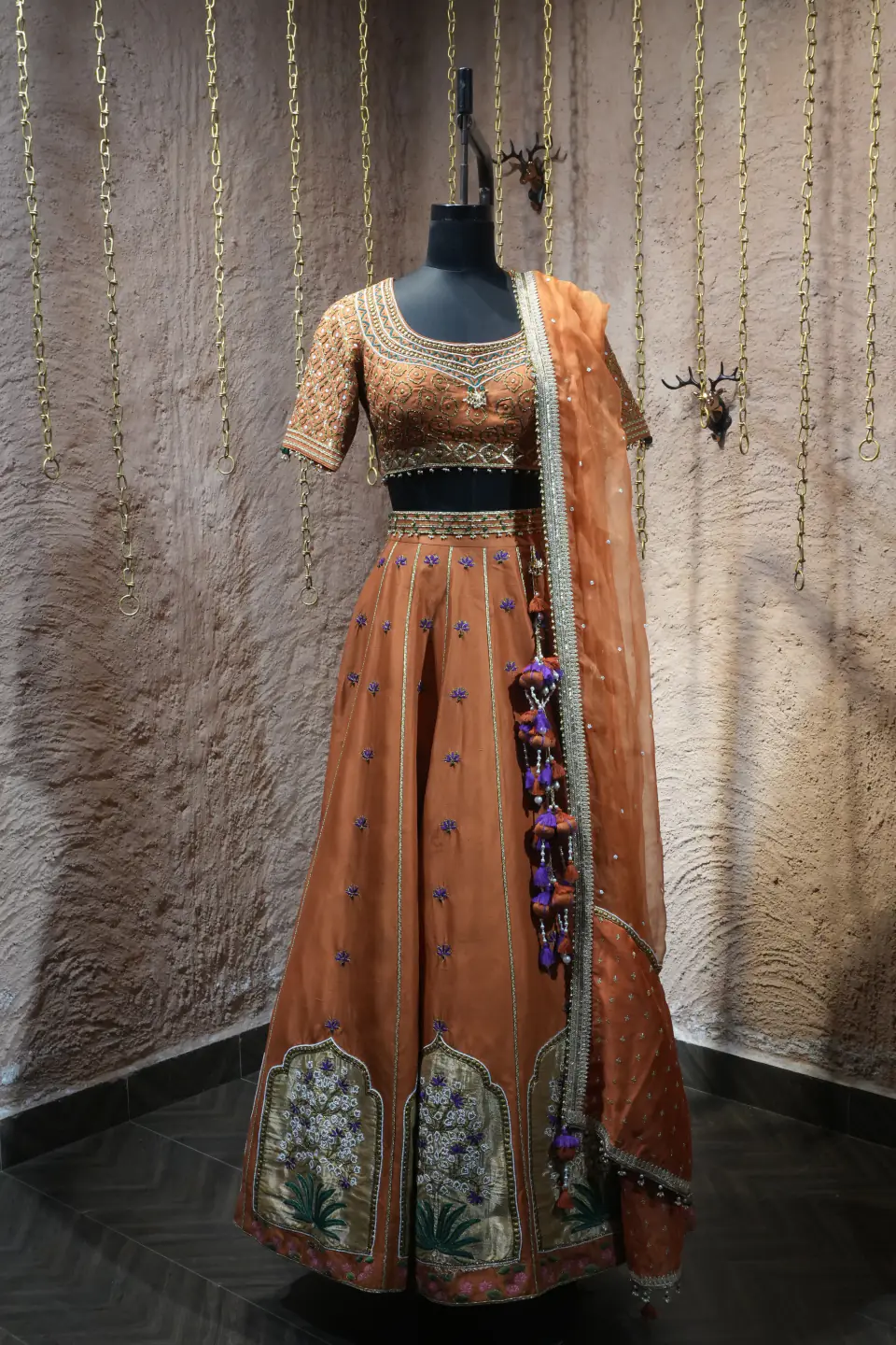 Rust Silk Lehenga with Mughal Arch Panels by Yukti Vohra — three-quarter view