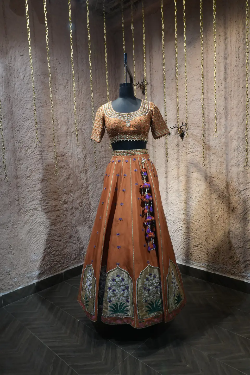 Rust Silk Lehenga with Mughal Arch Panels by Yukti Vohra — front view