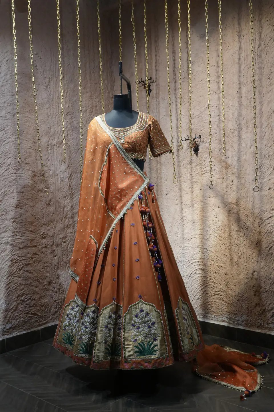 Rust Silk Lehenga with Mughal Arch Panels by Yukti Vohra — draped dupatta, front
